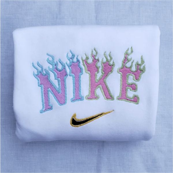 The Flames Nike embroidered crewneck in white with rainbow embroidery.