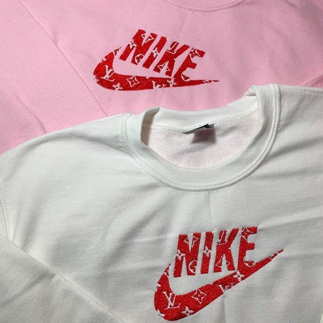 Layout of the LV Nike crewneck sweatshirts with red embroidery.