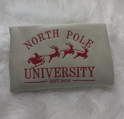 christmas theme north pole university embroidered sweatshirt in beige