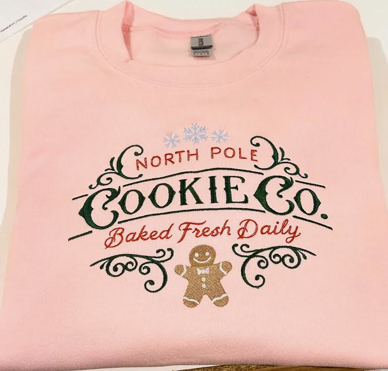 christmas north pole gingerbread embroidered sweatshirt in pink