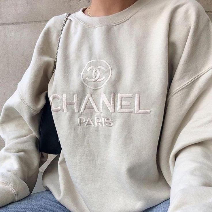 The vintage Chanel embroidered sweatshirt in light sand.