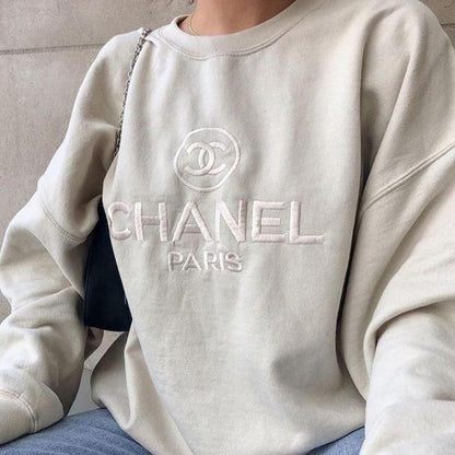 The vintage Chanel embroidered sweatshirt in light sand.
