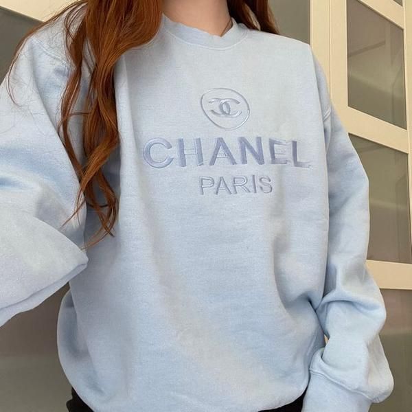 The vintage Chanel embroidered sweatshirt in light blue with light blue embroidery