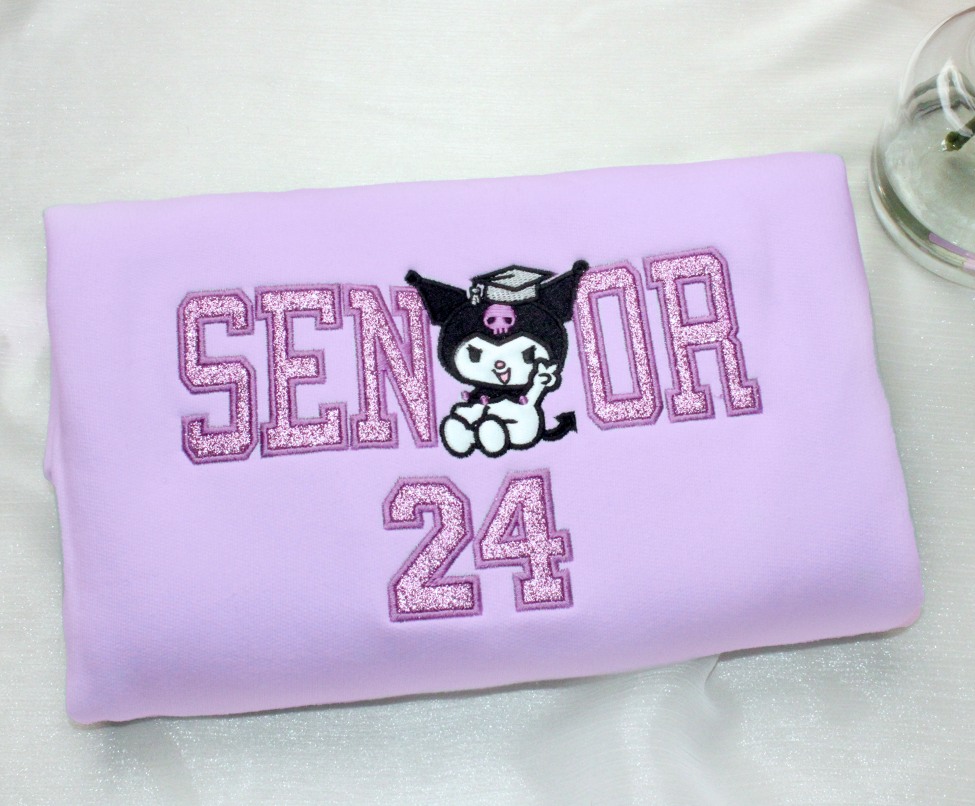 kuromi senior graduation kitty embroidered crewneck sweatshirt in purple